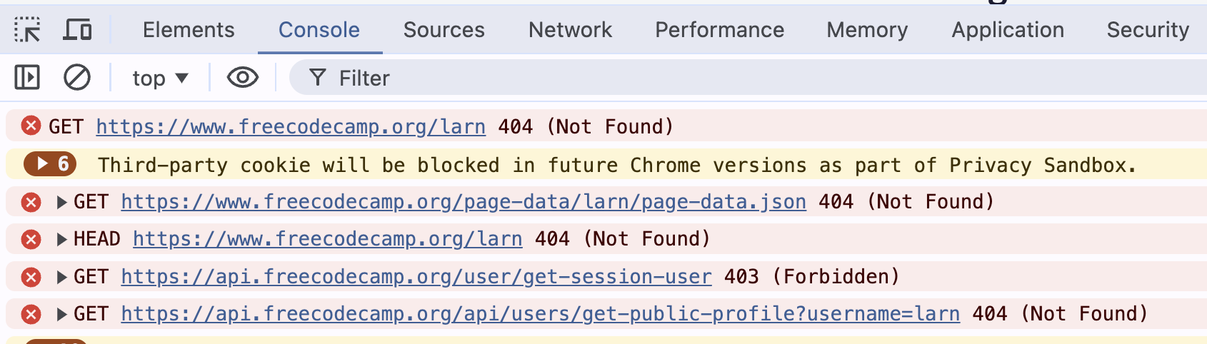 Chrome developer tools with the Console tab open, showing a 404 Not Found error for https://www.freecodecamp.org/larn, along with other related 404 errors.